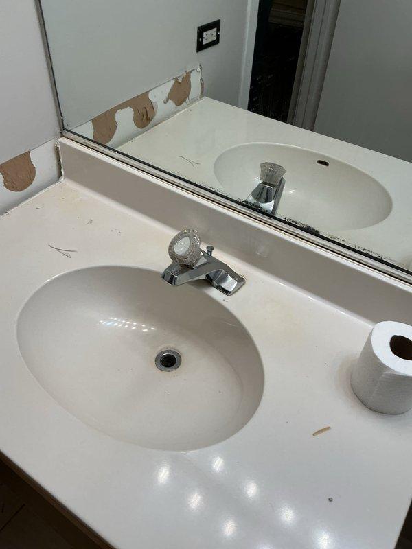 Responded to priority rescheduled service request for water leak repair and plumbing fixture replacement. Replaced shutoff valves under bathroom sink and kitchen sink to address leaking fixtures and ensure proper water control. Capped water line running to refrigerator as requested. Identified non-compliant PVC drain lines under kitchen sink, which violate building code requirements for structures exceeding five stories in height, and documented for future remediation. All accessible shutoff valves now operational and leak-free.