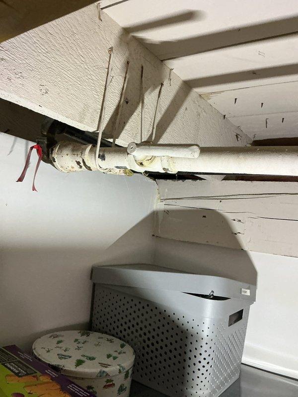 Responded to emergency gas leak call and conducted comprehensive inspection of gas line system. Located leak on deteriorated yellow-painted gas pipe in basement utility area showing significant wear and paint deterioration. Performed pressure test to verify leak location and assess system integrity. Repaired compromised section of gas line and replaced worn connections. Conducted post-repair pressure test to confirm proper seal and system safety, verifying all connections meet code requirements and operate within acceptable pressure parameters.