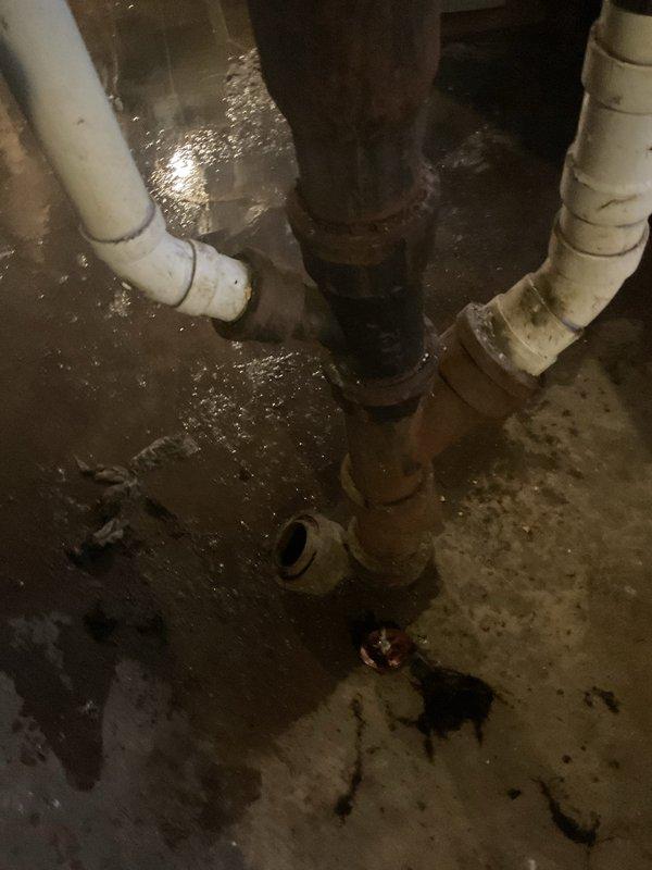 Responded to a clogged sewer line that had been causing issues for two days. Upon arrival, found significant water backup and flooding in the basement utility area affecting the main sewer line assembly. Cleared the blockage in the sewer line using professional drain cleaning equipment, restoring proper flow and drainage. Tested the system to confirm full functionality and began water extraction from the affected basement area.