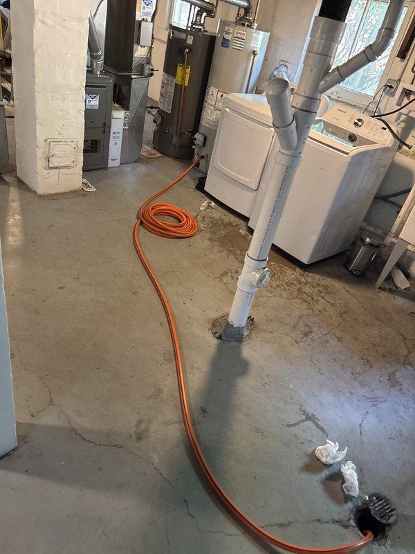 Completed comprehensive VIP maintenance service on residential water heater system in basement utility area. Performed thorough inspection of dual water heater installation, including dark gray and beige tank units, verified proper operation of all copper piping connections, brass valves, and safety relief components. Inspected and confirmed proper functioning of associated HVAC equipment, electrical panels, and mechanical systems in the utility space, with all equipment operating within manufacturer specifications and no issues identified.