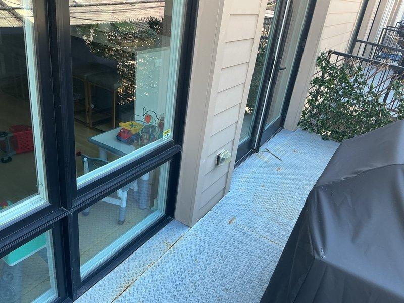 Completed plumbing service consultation and assessment at residential property with exterior balcony access. Conducted thorough visual inspection of outdoor living space to identify potential plumbing concerns and provided repair recommendations to customer. Documentation photos captured of service area for records.