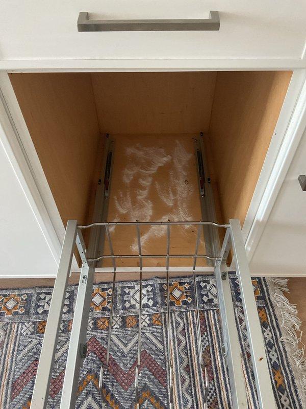 Responded to service call regarding persistent odor emanating from kitchen sink area for approximately two months. Inspected under-sink cabinet and plumbing configuration, including P-trap assembly, garbage disposal unit, and drain connections. Evaluated all visible plumbing components for proper installation, potential leaks, and sources of odor. Documented existing conditions of drain system and disposal unit for service records.