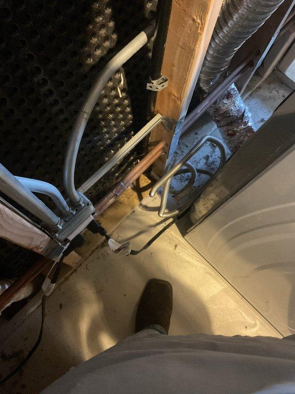 Performed comprehensive gas leak inspection and pressure test on residential gas system. Multiple gas leaks were identified throughout the system, requiring immediate shutdown of gas supply for safety. Documented all leak locations with photographs showing affected areas in mechanical room including connections near furnace, gas piping, and associated components.