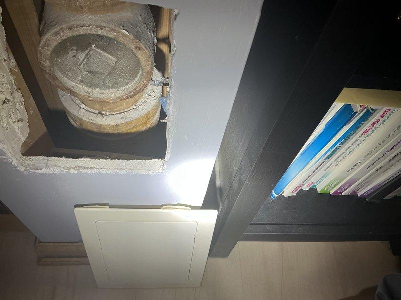 Performed video camera inspection of plumbing system to assess interior pipe conditions and identify potential issues. Documented findings with photographic evidence showing inspection equipment and ceiling-mounted ductwork penetration with access panel for future reference.