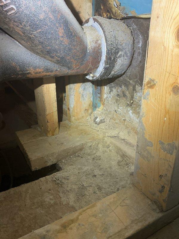 Responded to service call for water backup and drainage concerns in basement area where previous contractor had identified mold and potential drain tile failure. Conducted thorough inspection of sump pump system and drain tile infrastructure, documenting corroded drainage piping with visible rust deterioration and compromised sealing at pipe joints. Evaluated existing Richmond PowerVent 2 water heater (Model GGVRP75, 75,000 BTU, manufactured 04/2006) for potential removal and replacement. Provided comprehensive estimate for drain tile replacement system installation, new sump pump installation to address water management issues, and water heater removal services as requested.