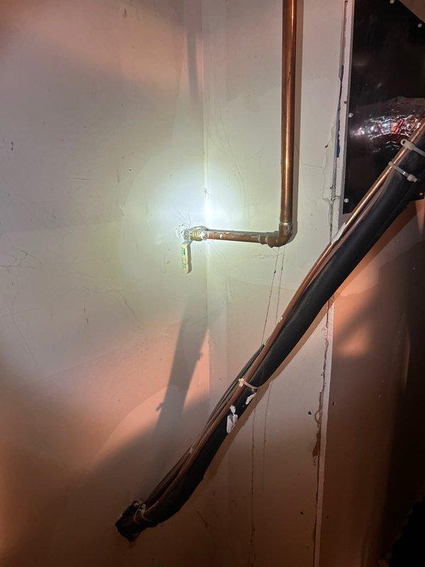 Inspected copper plumbing system and installed ball valve on horizontal pipe run. Service is currently on hold pending arrival of additional parts that have been ordered. Follow-up appointment has been scheduled to complete the installation once components are received.