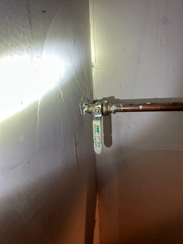 Inspected copper plumbing system and installed ball valve on horizontal pipe run. Service is currently on hold pending arrival of additional parts that have been ordered. Follow-up appointment has been scheduled to complete the installation once components are received.