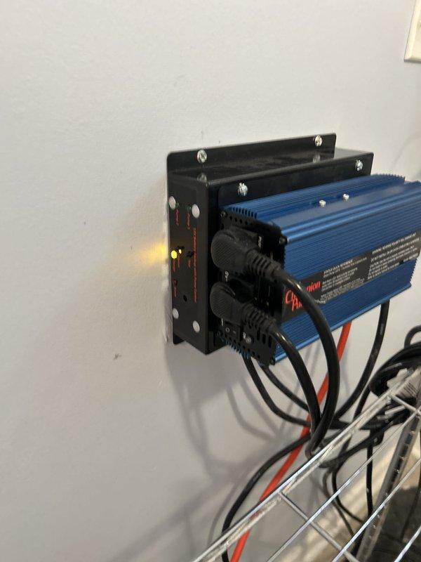 Performed warranty diagnostic on Champion backup sump pump system with power inverter/charger unit. Inspected electrical connections, verified LED indicator functionality, and confirmed proper operation of backup power system. Scheduled follow-up appointment to rod cleanout as requested.