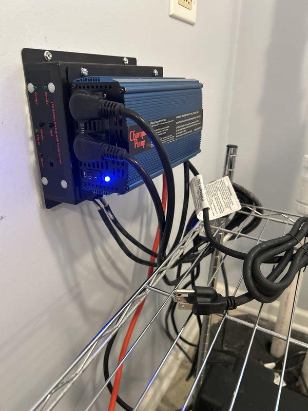 Performed warranty diagnostic on Champion backup sump pump system with power inverter/charger unit. Inspected electrical connections, verified LED indicator functionality, and confirmed proper operation of backup power system. Scheduled follow-up appointment to rod cleanout as requested.