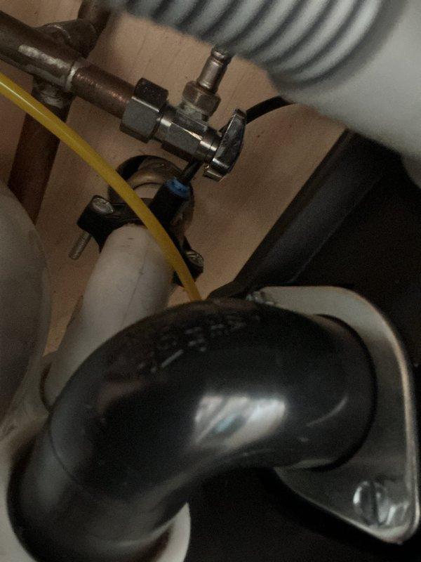 Responded to service call for reverse osmosis system evaluation and potential maintenance needs. Upon arrival, inspected under-sink RO system installation including storage tank, filtration components, and associated plumbing connections. Assessed condition of pre-filters, post-filters, membrane housing, and pressure tank to determine maintenance requirements. Evaluated system performance, checked for leaks at connection points, and verified proper operation of shut-off valves and feed water line. Documented existing system configuration with photos showing current installation layout, component placement, and plumbing connections for maintenance planning purposes.