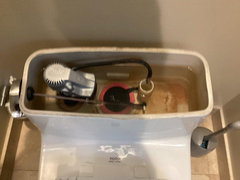 Responded to service call for humming noise occurring in master bedroom toilet when flushed. Inspected toilet tank components and fill valve assembly. Identified issue with fill valve mechanism causing vibration during refill cycle. Adjusted fill valve and tested flush operation to verify noise elimination and proper tank refill function.