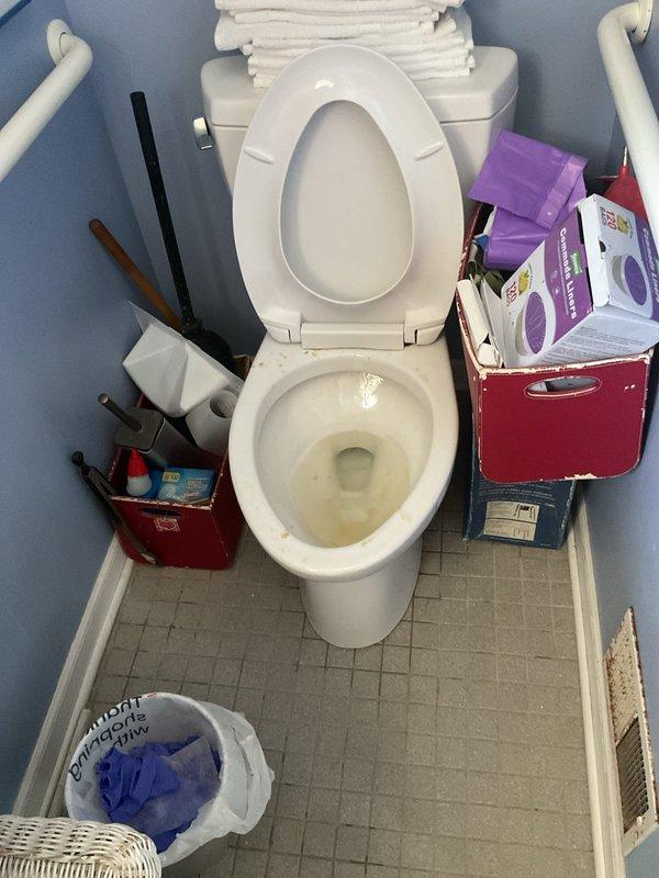 Responded to a clogged toilet in a 95-year-old residential property. Upon arrival, assessed the standard toilet fixture and confirmed complete blockage preventing proper drainage. Utilized professional plumbing auger to clear obstruction from the toilet trap and drain line. Successfully removed blockage, restored full water flow, and verified proper flushing operation. Tested fixture multiple times to ensure complete resolution and proper drainage function.