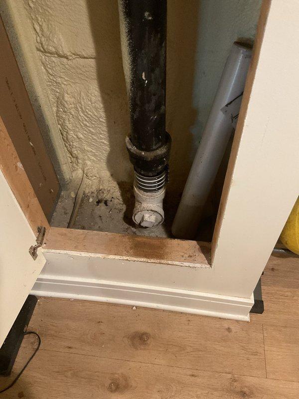 Responded to sewage backup through lowest level shower drain caused by root intrusion in main sewer line. Performed mechanical rodding of main drain line to clear blockage and restore proper drainage flow. Accessed main cleanout, removed root mass and debris from line, and verified clearance through system testing. Documented existing conditions including deteriorated pipe sections and root infiltration points for future permanent repair recommendations.