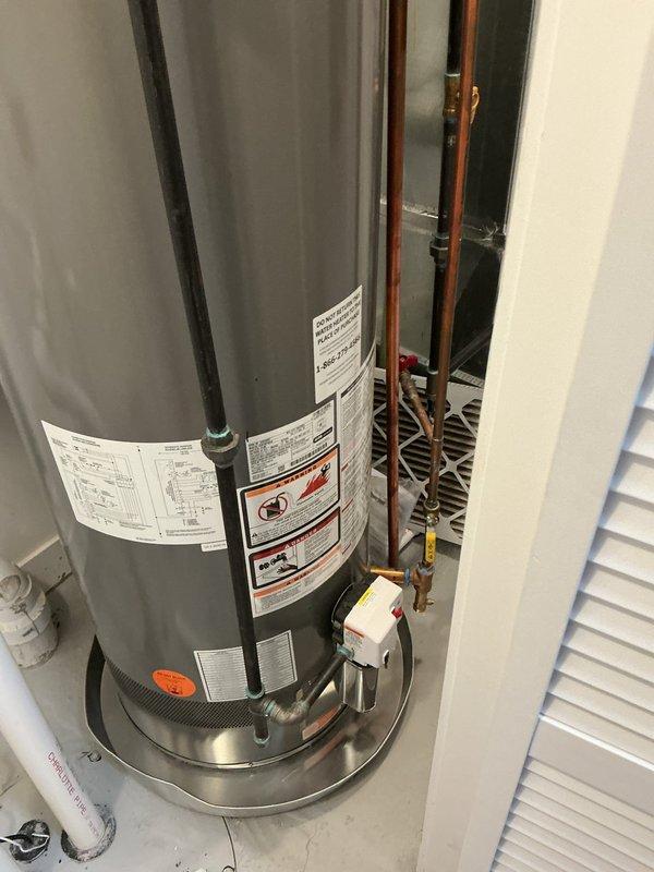Responded to a master bathroom shower complaint involving no hot water and a dripping shower valve. Upon inspection, diagnosed a faulty water heater and malfunctioning shower cartridge causing both the lack of hot water supply and the continuous drip when the fixture was in the off position. Accessed the water heater in the mechanical room, verified temperature settings, and inspected all plumbing connections. Replaced the defective shower cartridge in the master bathroom valve assembly to eliminate the dripping issue and restored proper hot water flow to the fixture. Tested all functions to ensure proper operation and confirmed full restoration of hot water delivery and complete shutoff capability.