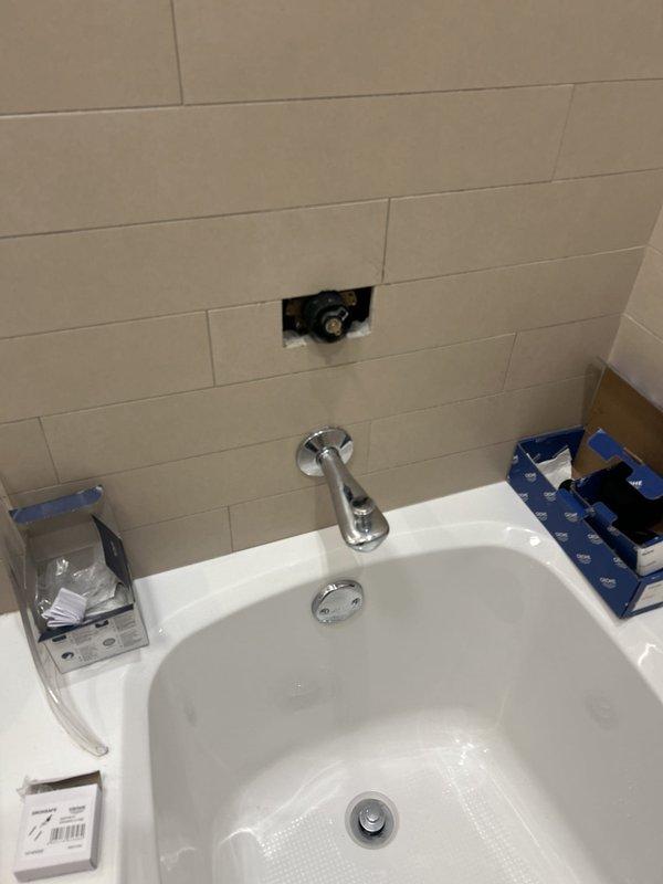Completed installation of Grohe Relexa matte black shower trim kit in bathroom, including mounting new spout, valve escutcheons, and all associated hardware to existing rough-in plumbing. Performed routine maintenance service on water heater, including inspection and testing of all components to ensure proper operation and safety.