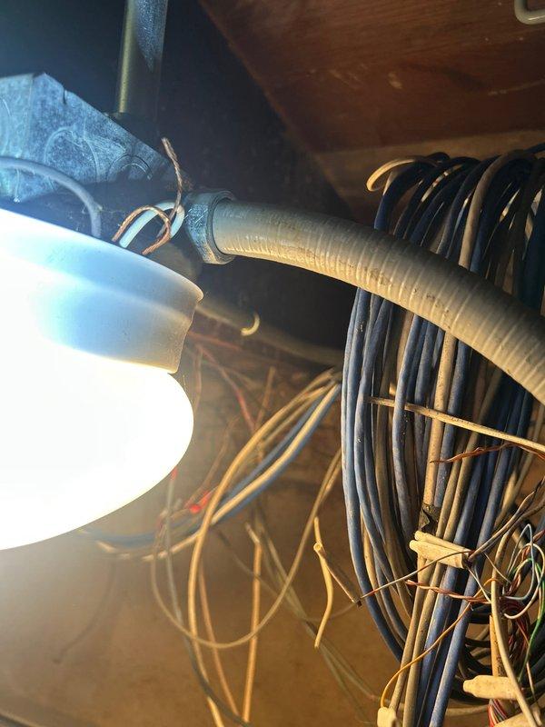 Conducted site assessment for water service line reconfiguration required to accommodate new municipal water meter installation. Existing meter space measures 24 inches, while new city-issued meter requires 27 inches of clearance. Evaluated current piping configuration, including corroded main shut-off valve assembly and existing copper supply lines. Documented existing conditions showing significant corrosion on valve body and aging infrastructure in basement utility area. Provided detailed estimate for pipe reconfiguration work necessary to create adequate space for new meter installation, including removal and replacement of existing valve assembly, modification of supply piping, and ensuring proper clearances meet municipal requirements.