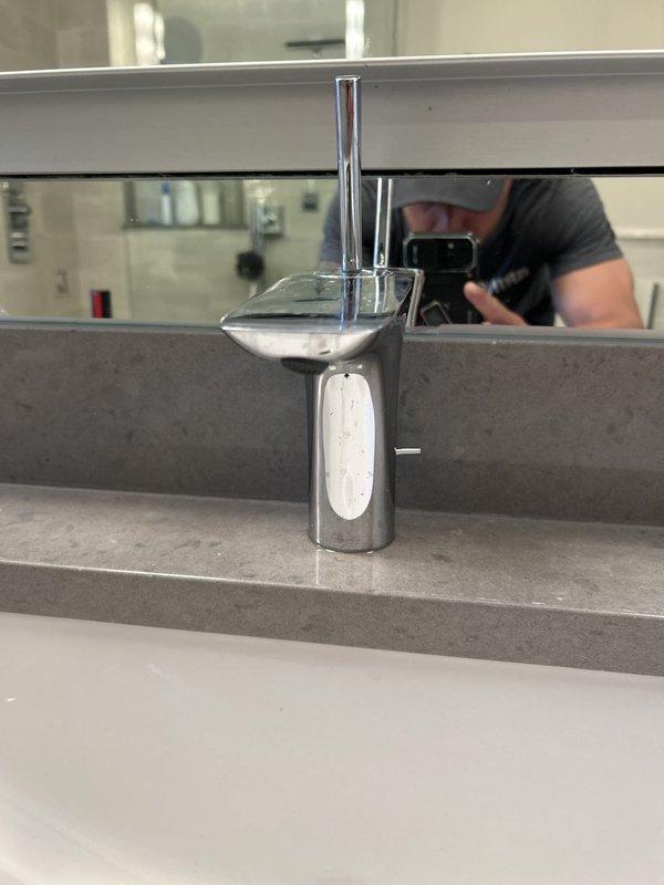Responded to service call for toilet noise issue and shower leak. Diagnosed and resolved thump noise occurring during toilet flush cycle. Addressed leaking shower nozzle that had become loose and was causing water discharge from side of shower assembly. Replaced drain stopper mechanism and pop-up assembly in sink basin. All plumbing fixtures tested and verified operational upon completion.