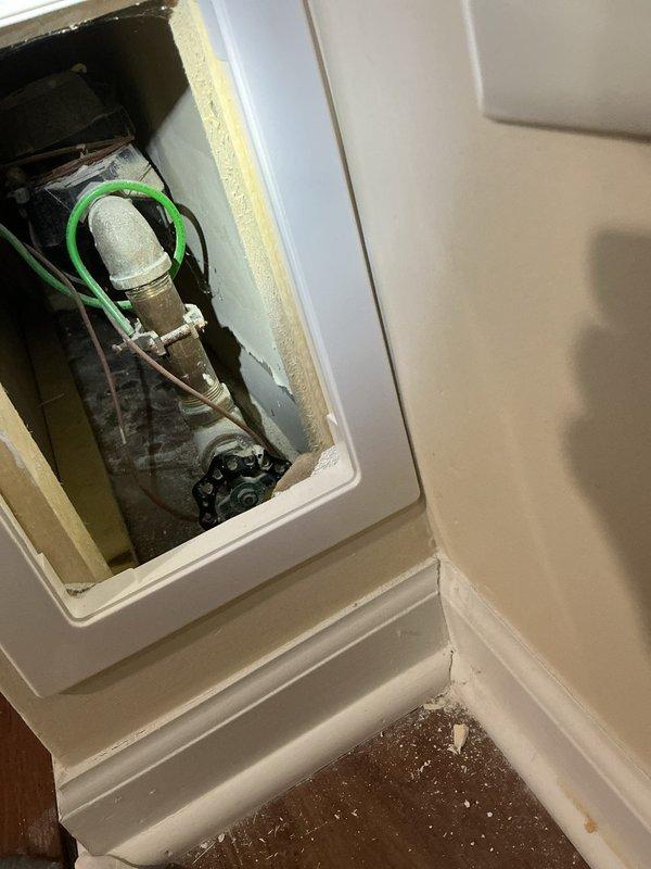 Responded to no-flow condition at exterior spigot. Accessed interior wall cavity to inspect supply plumbing and identified obstruction in water line feeding outdoor fixture. Cleared blockage, tested valve operation, and restored full water flow to exterior spigot. Verified system functionality and secured access panel upon completion.