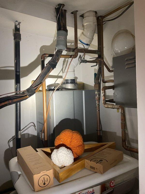 Responded to priority service call for outdoor spigot leaking into ceiling above basement area. Upon inspection, identified failed spigot connection at exterior brick wall causing water to spray behind wall when activated. Replaced defective hose bib with new brass spigot, ensuring proper seal and weatherproofing at wall penetration. Tested system under full pressure to verify repair eliminated interior water intrusion. Placed temporary signage on exterior spigot advising against use during repair process. Confirmed no active leaking in basement ceiling following installation and pressure testing.