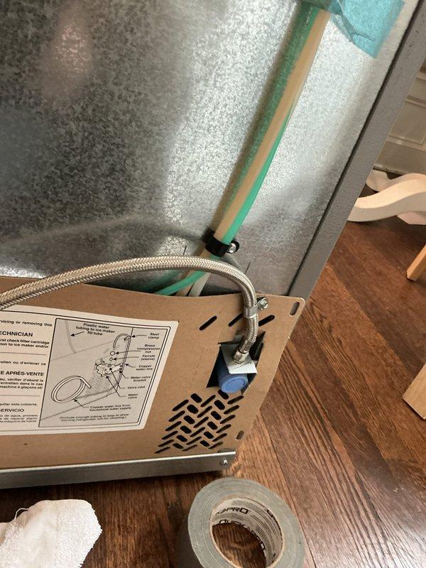 Responded to priority water leak behind refrigerator in century-old home where quarter-inch copper water line had been leaking for five days. Replaced failed copper supply line with new braided stainless steel flex hose, installed proper brass fittings, and tested connections for leaks. System restored to full operation with no active leaks detected upon completion.