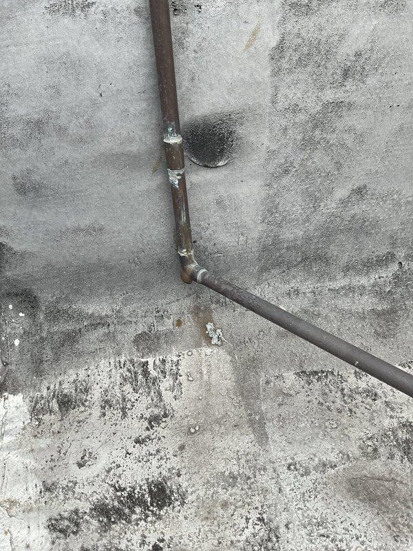 Completed spot repair on rooftop spigot that was experiencing active leaking. Performed comprehensive annual plumbing maintenance inspection, including evaluation of tankless water heater system and associated components. Documented Rinnai tankless unit installation with proper venting, copper supply lines, hot and cold isolation valves, and expansion tank configuration, all found to be in satisfactory operating condition.