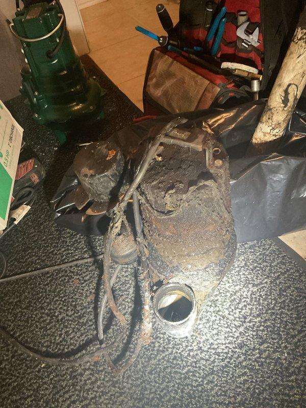 Responded to clogged drain system affecting HVAC condensate line and toilet function. Upon arrival, found HVAC drain pipe backed up with standing water to capacity, creating odor issues, and compromised toilet flushing throughout the property. Deployed submersible pump to extract standing water from affected drainage system. Inspected and cleared main drain line obstruction that was causing backup in both HVAC condensate drainage and toilet waste lines. Removed accumulated debris and sediment buildup from drain system. Verified proper drainage flow restored to HVAC unit and confirmed toilets flushing at normal capacity upon completion.