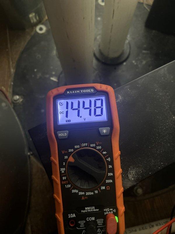 Responded to warranty service call for sump pump installation from 2022 that was not operating correctly. Performed diagnostic testing using digital multimeter, which indicated voltage reading of 14.48 DC, suggesting potential power supply or electrical component issues. Conducted thorough inspection and maintenance of the sump pump system, examining mechanical components, housing, and mounting brackets for proper operation and identifying areas of wear and dust accumulation that required attention.