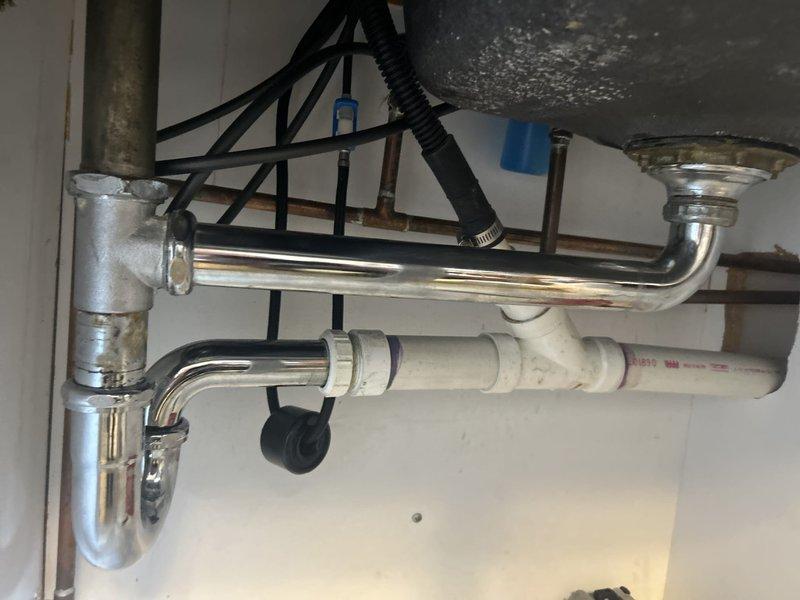 Installed customer-supplied kitchen faucet, including connection of hot and cold water supply lines with braided stainless steel hoses and proper mounting of all hardware beneath the sink. Verified all connections for leaks and confirmed proper operation of the new faucet upon completion.