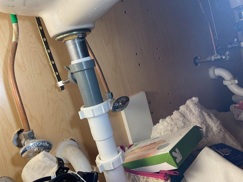 Responded to a clogged bathroom pedestal sink that was unresponsive to homeowner's attempts with a hand snake and plunger. Removed obstruction consisting of hair buildup, debris, and a small plastic film fragment from drain line. Replaced broken sink stopper assembly to restore proper drainage and functionality.