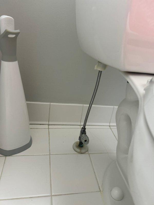Responded to service call for toilet constantly running and not filling properly. Upon inspection, found severely deteriorated internal tank components with extensive rust contamination and sediment buildup in tank water. Fill valve assembly showed signs of malfunction with compromised float mechanism. Flush valve flapper exhibited wear and deterioration. Tank interior displayed significant rust staining and mineral deposits on porcelain surfaces and mechanical components, indicating long-term water quality issues and component degradation. Documented existing conditions with photographs showing brown-tinted water, corroded internal mechanisms, and compromised sealing surfaces. Assessed water supply line and shut-off valve functionality at floor connection. Provided estimate for complete tank rebuild including replacement of fill valve assembly, flush valve, flapper, and associated hardware to restore proper operation and eliminate continuous running condition.