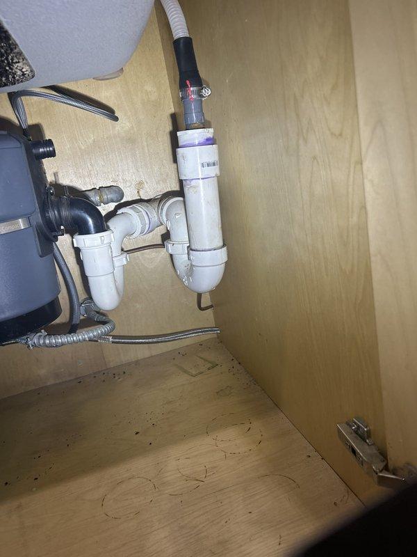 Installed new shutoff valve behind refrigerator to provide water supply isolation capability where no existing shutoff was previously present. Accessed plumbing lines in crawl space beneath kitchen area, identified appropriate water supply line, and completed valve installation per standard plumbing code requirements. Verified proper operation of shutoff valve and confirmed no leaks at connection points upon completion.