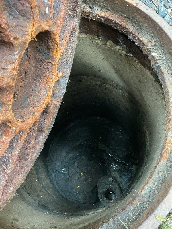 Completed comprehensive annual plumbing maintenance inspection of residential property. Performed thorough examination of water heater system, noting active moisture accumulation at base of unit and assessing condition of copper supply lines, pressure relief valve, and connection points. Inspected ductwork system, documenting advanced corrosion on metal piping with significant rust deterioration and interior sediment buildup requiring future attention.