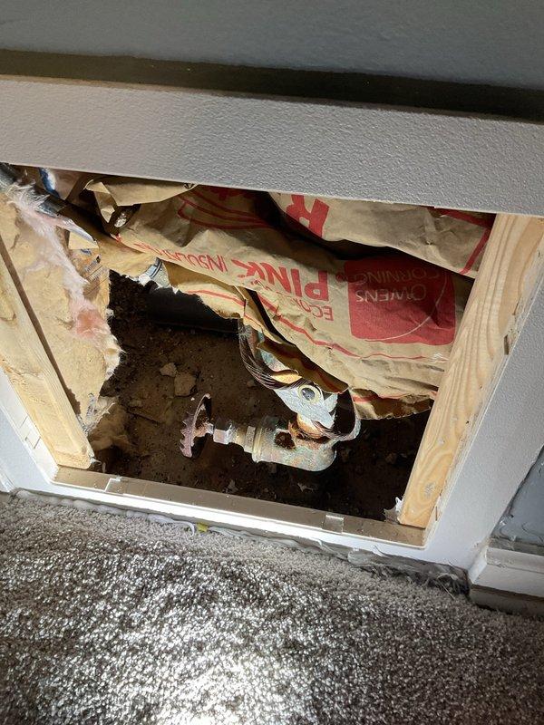 Responded to service call for two leaking outdoor spigots and toilet gurgling issue. Inspected exterior hose bibs and identified worn vacuum breaker components causing the leaks. Removed and replaced defective vacuum breaker assemblies on both outdoor spigots, ensuring proper sealing and operation. Tested both fixtures under full water pressure to confirm leaks were eliminated. Additionally, investigated interior plumbing system through wall access point, observing conditions of supply lines and checking for any related issues that could contribute to the toilet concerns. All outdoor spigot repairs completed successfully with fixtures operating without leaks.