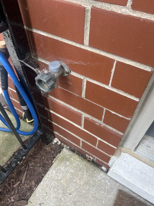 Completed comprehensive VIP plumbing maintenance inspection of residential property. Inspected exterior hose bib mounted on brick wall, verified proper operation and checked for leaks or freeze damage, and examined interior HVAC system plumbing connections including refrigerant lines and condensate drainage components to ensure all systems were functioning properly with no active issues detected.