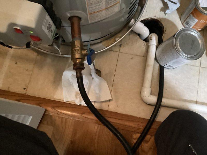 Completed annual maintenance service on residential water heater, including inspection of tank condition, testing of temperature and pressure relief valve, verification of proper venting, and examination of all plumbing connections and shut-off valves. Evaluated Kohler shower/tub control fixture with dripping issue; assessed valve cartridge condition and water flow patterns to determine necessary repairs. Documented equipment conditions with photographic records for maintenance history in 16-year-old home.