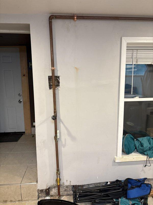 Completed warranty replacement of seven bell hangers and copper band iron straps on exposed copper water supply lines. Removed existing worn support hardware and installed new bell hanger assemblies and reinforced copper band iron straps to ensure proper pipe support and prevent stress on joints. All copper piping was secured to structural members per code requirements, with proper spacing between hangers to prevent sagging and water hammer. Verified all connections remained secure and leak-free after hardware replacement.