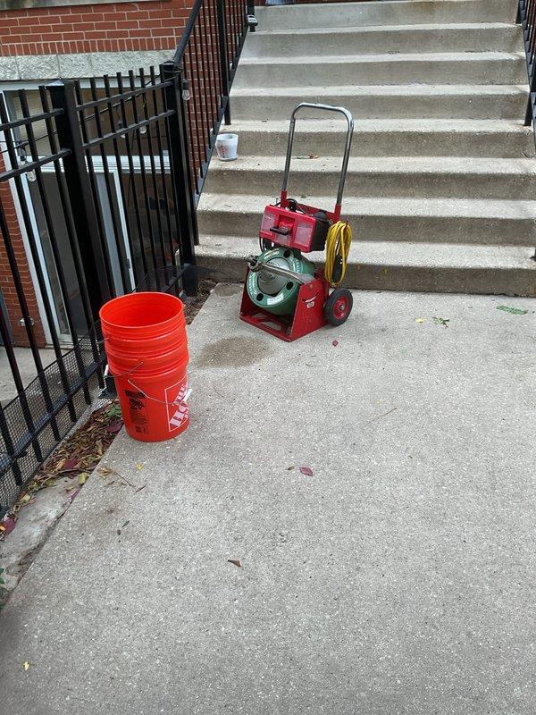 Responded to drainage issue at front sunken patio where water was pooling on surface during heavy rain events, creating concern for potential water intrusion into residence. Deployed professional drain cleaning equipment to access and clear catch basin system serving the 25-year-old patio area. Successfully restored proper drainage flow, eliminating standing water concerns and mitigating risk of foundation water damage.