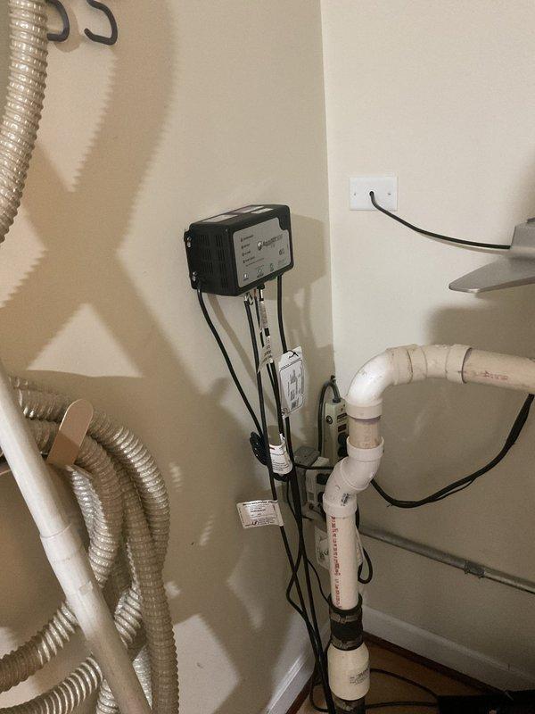 Responded to service call for non-functional sump pump with battery backup system in 24-year-old residential property. Upon arrival, conducted comprehensive diagnostic assessment of the existing sump pump installation, including primary pump unit, battery backup system, and associated discharge piping configuration.

Inspection revealed the sump pump system installed in basement utility area with PVC discharge lines and black primary pump unit mounted on basin. Evaluated electrical connections, battery backup controller mounted on wall, and integration with HVAC condensate drainage system. Testing confirmed pump failure and battery backup malfunction requiring immediate attention to prevent potential basement flooding.

Performed necessary repairs and system restoration to return sump pump and battery backup to full operational status. Verified proper pump cycling, float switch operation, and battery backup engagement during simulated power loss conditions. Tested discharge line flow a