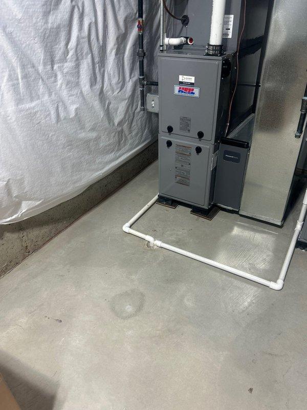 Provided consultation and detailed documentation for proper water heater installation best practices. Reviewed installation specifications including brass flex connections, full port ball valves, gas appliance valve with union, proper water heater pan placement with drain line to floor drain, and correct nipple and coupling configurations. Scheduled installation appointment for morning completion, with customer requesting work to be finished before 1PM. Documented existing HVAC furnace setup and PVC drainage system in basement utility area to ensure proper coordination with water heater installation work.