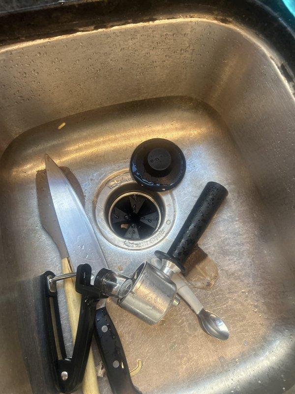 Replaced a 14-year-old worn-out garbage disposal unit with a new disposal system, including removal of the existing unit, installation of new mounting assembly and drain connections, and verification of proper operation. Additionally, performed repairs to the kitchen faucet to restore full functionality.