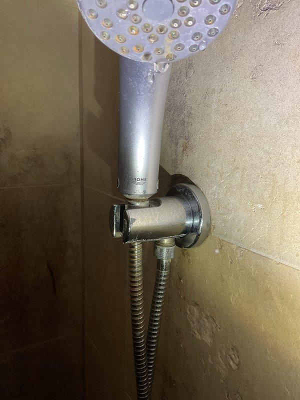 Reconfigured kitchen sink drainage system to separate garbage disposal and sink trap from shared dishwasher connection. Installed new PRO SS garbage disposal unit with independent drain line and proper mounting hardware, ensuring code-compliant plumbing configuration with dedicated trap assemblies for each fixture.
