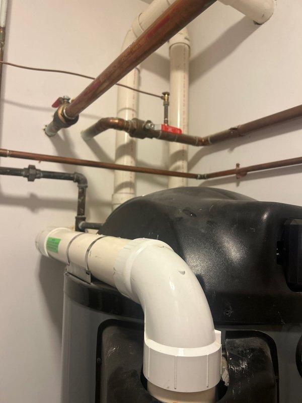 Responded to ignition failure on commercial Rheem tanked water heater. Diagnosed ignition system malfunction, documented equipment configuration and plumbing connections, and provided repair estimate for customer approval.
