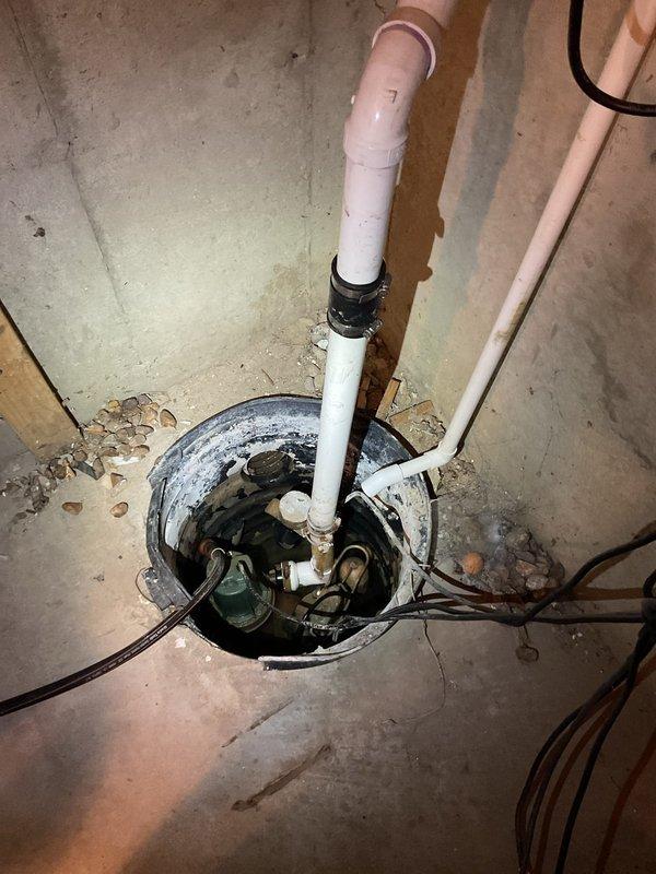 Responded to service call for non-functional backup sump pump system with inoperative float switch and battery. Upon inspection, diagnosed failed backup battery and malfunctioning float assembly in the sump pit. Replaced backup battery unit and installed new float switch mechanism to restore emergency pumping capability. Tested primary and backup pump operations to verify proper cycling and float activation at appropriate water levels. Confirmed all electrical connections were secure and system returned to full operational status with functional battery backup protection.