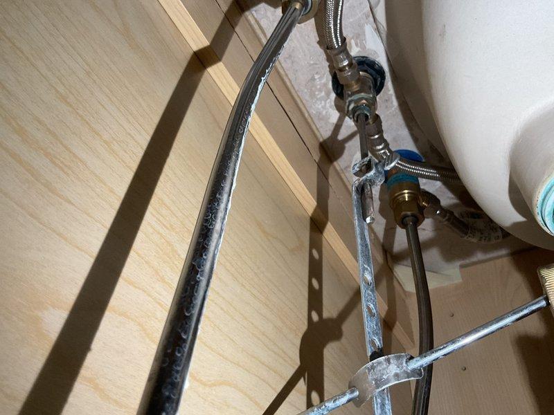Responded to service call for toilet repair where previous technician had removed toilet components. Upon arrival, assessed bathroom plumbing system and reinstalled complete toilet assembly with new supply line connections. Installed braided stainless steel flexible water supply lines with proper shut-off valve, ensuring all connections were secure and leak-free. Tested toilet functionality and verified proper water flow through supply lines and fill valve operation.