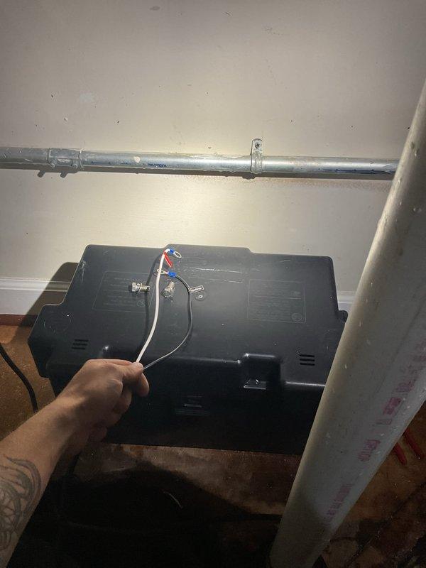 Responded to emergency flooding situation on third service call. Performed diagnostic testing on drainage system using pressure gauges and identified failure point in main sewer line. Accessed underground plumbing system through floor access point, inspected PVC drainage pipes and pump assembly in crawl space area. Located blockage causing backup and overflow condition, cleared obstruction from main drain line, and verified proper flow restoration through system testing.
