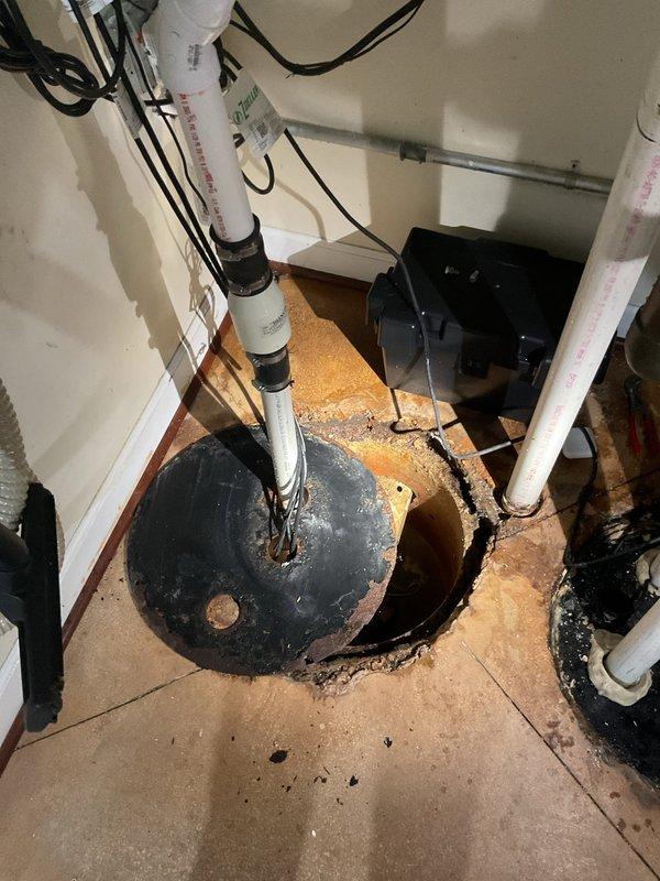 Responded to emergency flooding situation on third service call. Performed diagnostic testing on drainage system using pressure gauges and identified failure point in main sewer line. Accessed underground plumbing system through floor access point, inspected PVC drainage pipes and pump assembly in crawl space area. Located blockage causing backup and overflow condition, cleared obstruction from main drain line, and verified proper flow restoration through system testing.