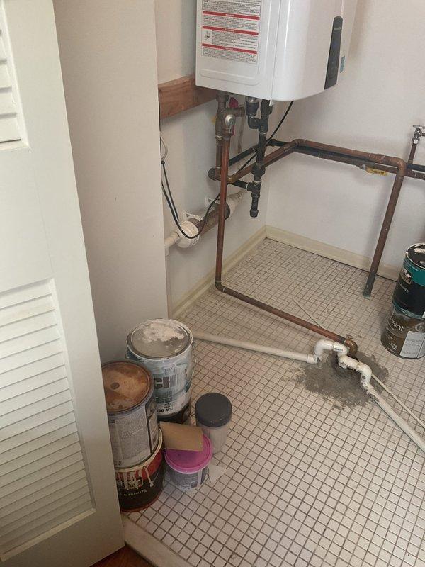 Completed VIP plumbing maintenance inspection of mechanical room containing tankless water heater, HVAC equipment, and associated plumbing systems. Documented existing conditions including copper supply lines, PVC drainage piping, and water heater connections. Part required for repair has been ordered and is currently in shop awaiting installation during follow-up service call.