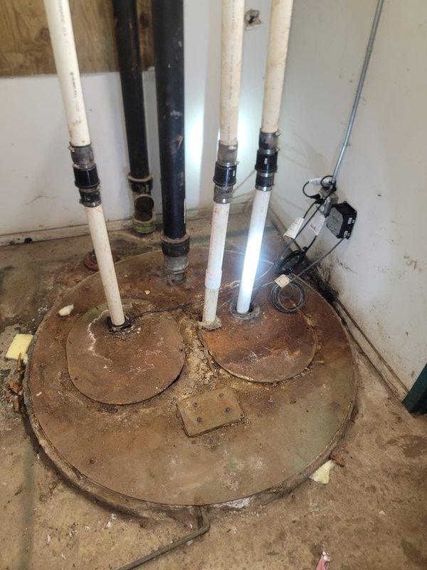 Conducted comprehensive site assessment of commercial building's plumbing infrastructure to provide estimate for annual maintenance services. Evaluated multiple vertical drain lines with PVC and black pipe configurations, inspected sump pump basin with corroded covers requiring cleaning, and assessed pump room electrical systems and discharge piping. Provided detailed quote for rodding and camera scoping of entire plumbing system, along with complete cleanout and maintenance of sewer basin and associated pump equipment.