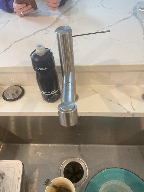 Installed homeowner-supplied kitchen sink faucet, replacing the existing fixture. Completed all necessary connections to existing hot and cold water supply lines under the sink, verified proper operation and tested for leaks. Installation was completed successfully with no issues identified.
