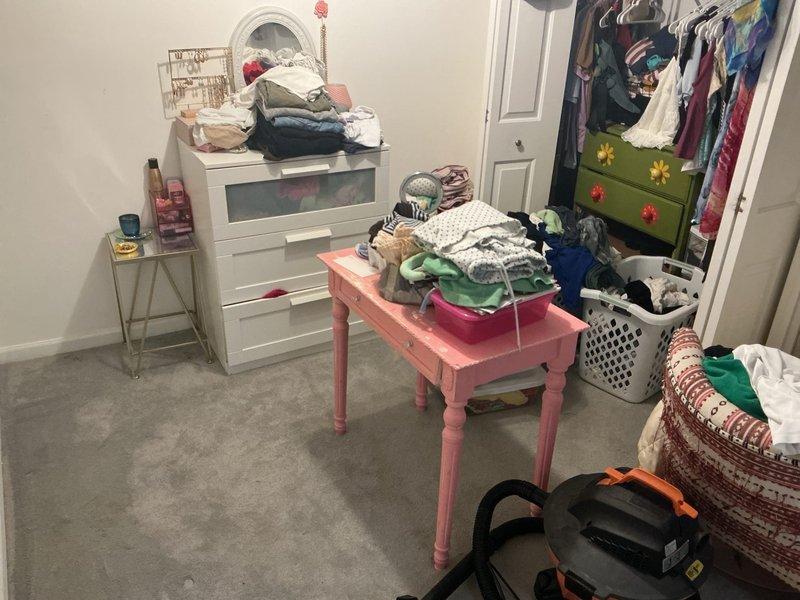 Responded to service call for water leak originating from exterior and penetrating into home. Upon investigation, traced leak pathway into interior bedroom area where water intrusion was evident. Documented affected areas showing bedroom space with visible water damage concerns. Identified leak source from outside wall penetrating into living space, assessed extent of interior water infiltration, and photographed impacted bedroom areas for documentation purposes.